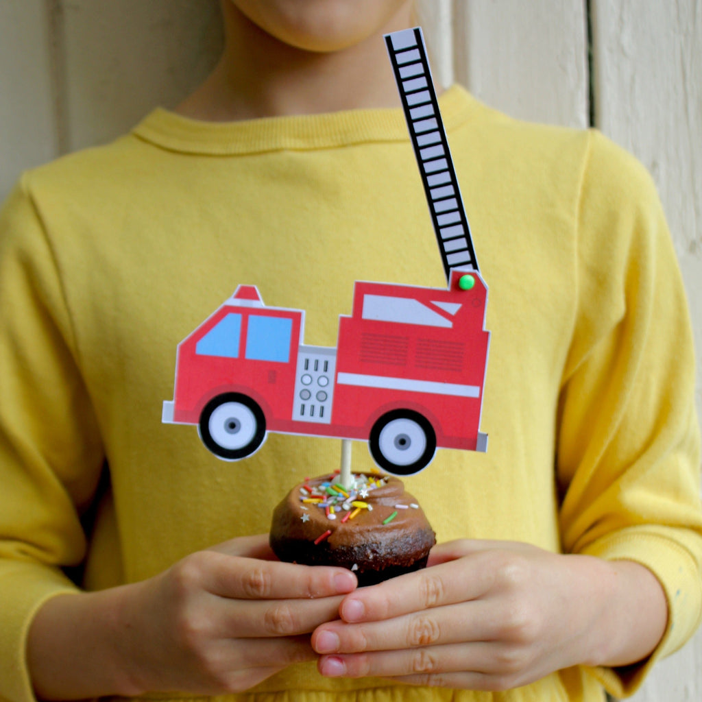 DIY fireman cupcake kit for kids. Natural cupcakes, fun sprinkles. Fun craft activity to make moving fireman themed cupcake toppers. Includes firetrucks